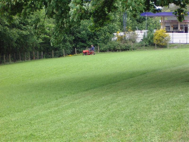 Mowing the eastern field on a machine